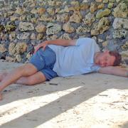 Resting at Bulabog Beach after a long windsurfing session for Markus.